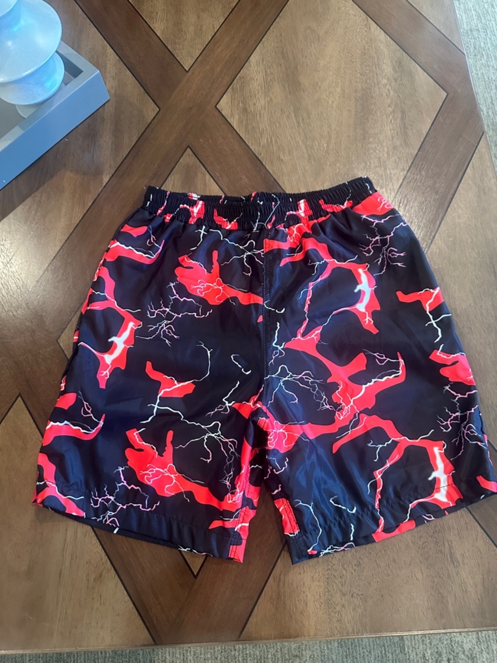 SHEIN Black Swim Trunks with Red Lightning Print